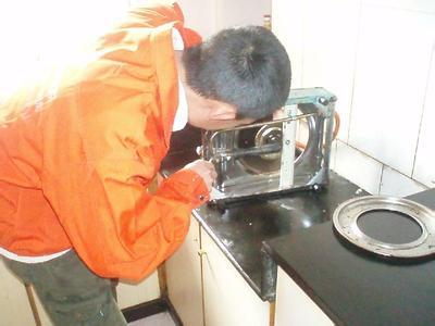 重庆海尔燃气灶售后维修电话(海尔微笑服务,感受超前维修)